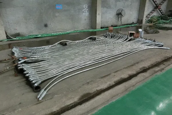 Oilfield high pressure hoses showing technical routing and clamps