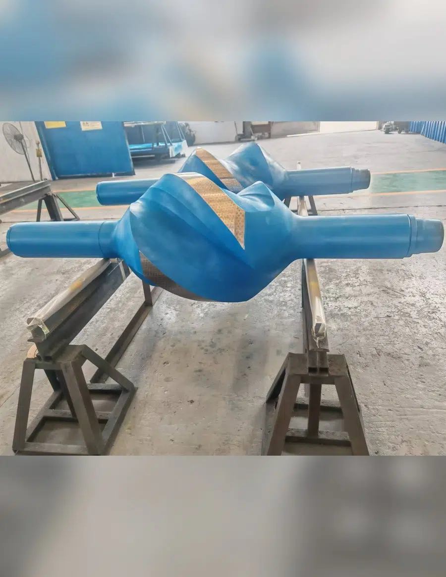 Finished drilling stabilizer body with spiral blades, side view
